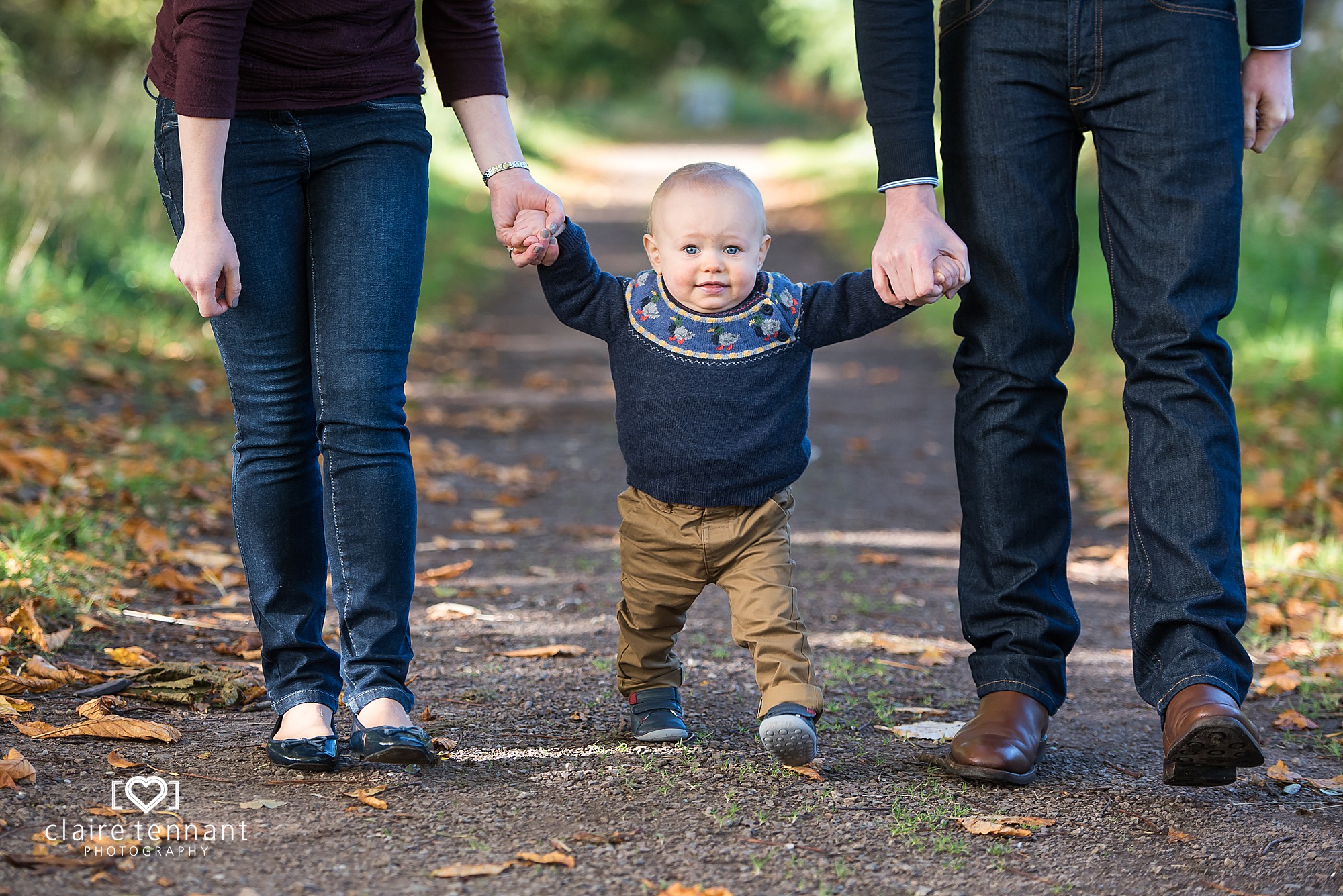 toddler with parents